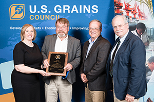 Charles Ring receiving an award