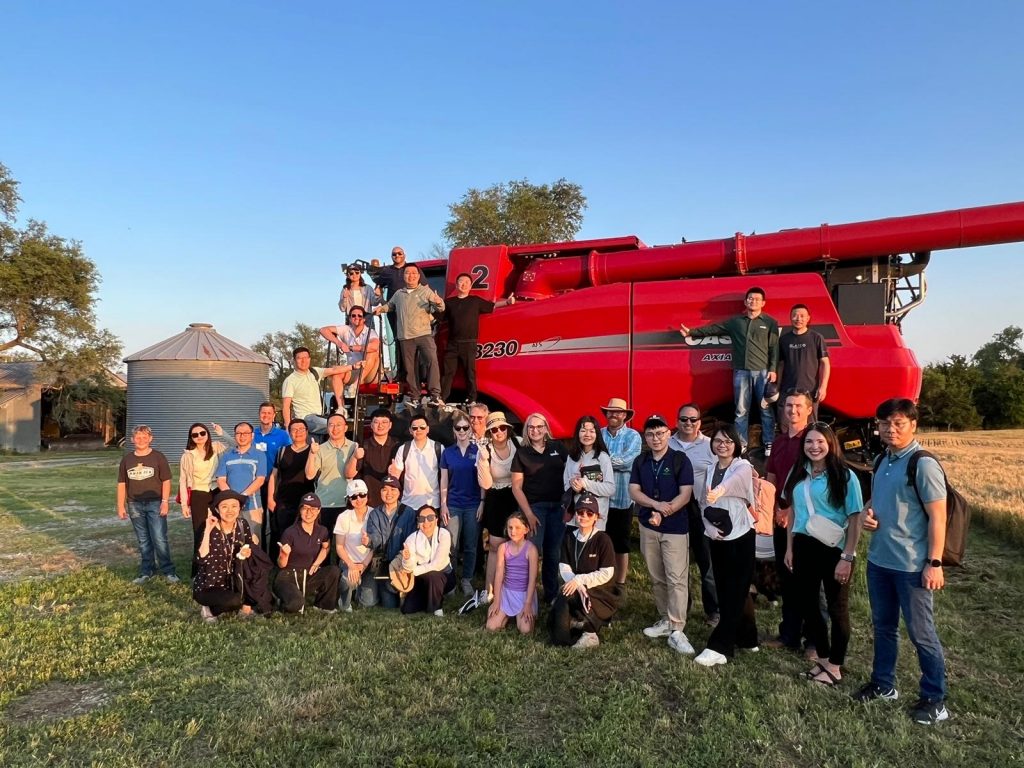 image of people with farm machinery