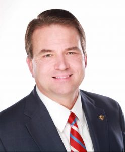 headshot of John Lummus