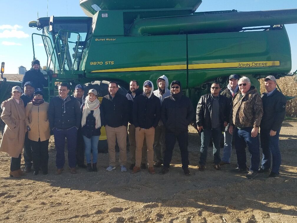 LTA ExEx Trade Team- trade team standing in front of combine
