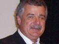 Headshot of Glen Buckley in Suit